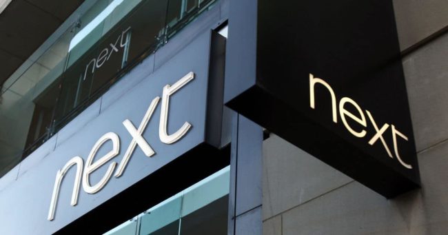Next reports record growth